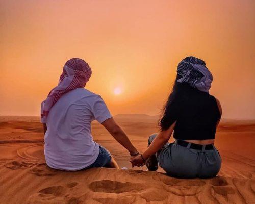 Couple in Dubai desert dune image
