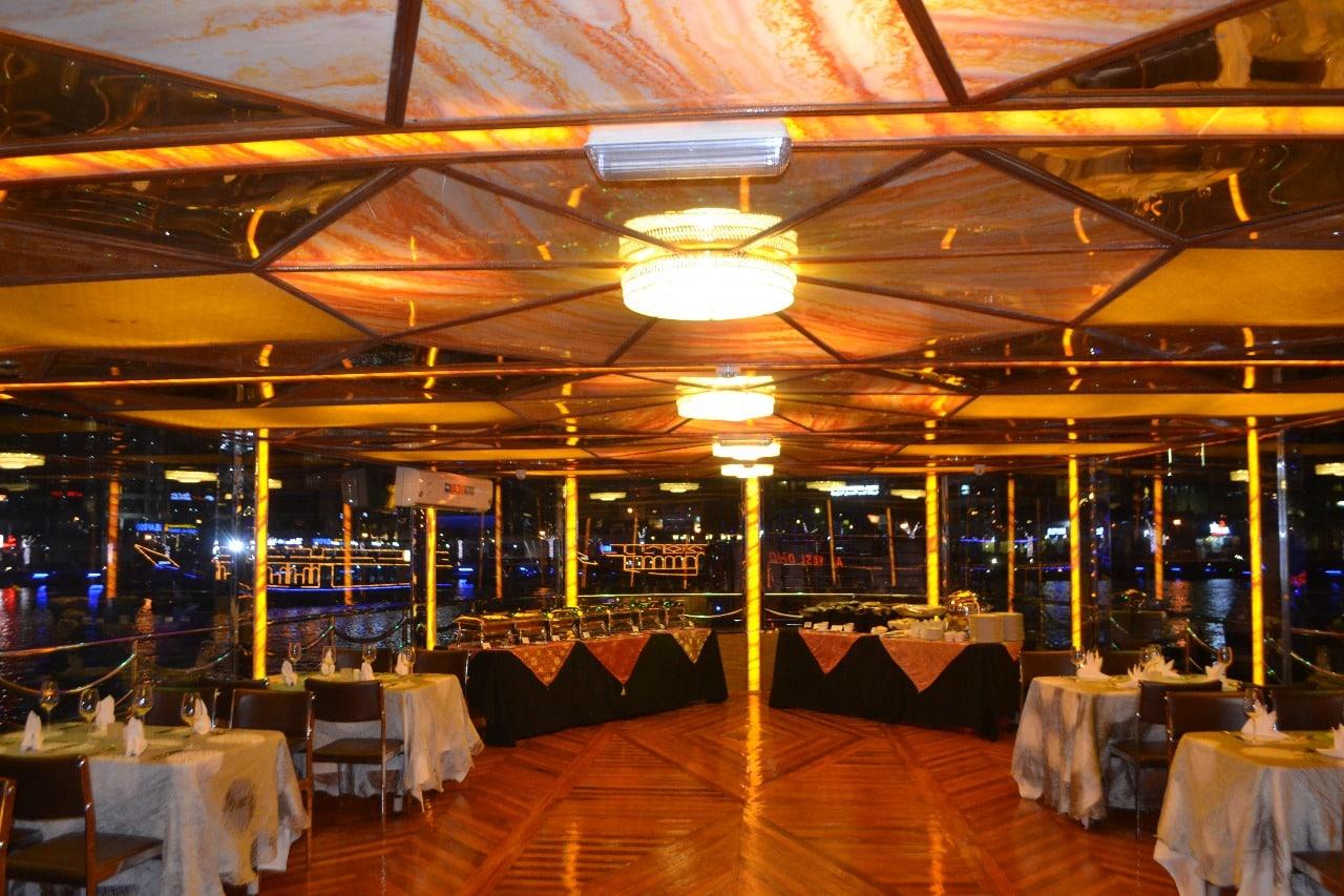 Dhow cruise restaurant in Dubai desert dune