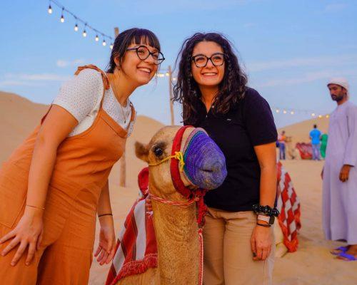 Picture with camel in Dubai desert dune image