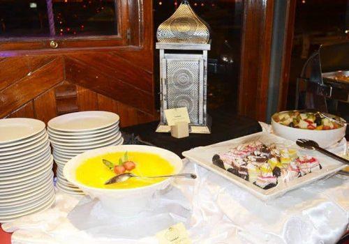 Dhow cruise restaurant in Dubai desert dune